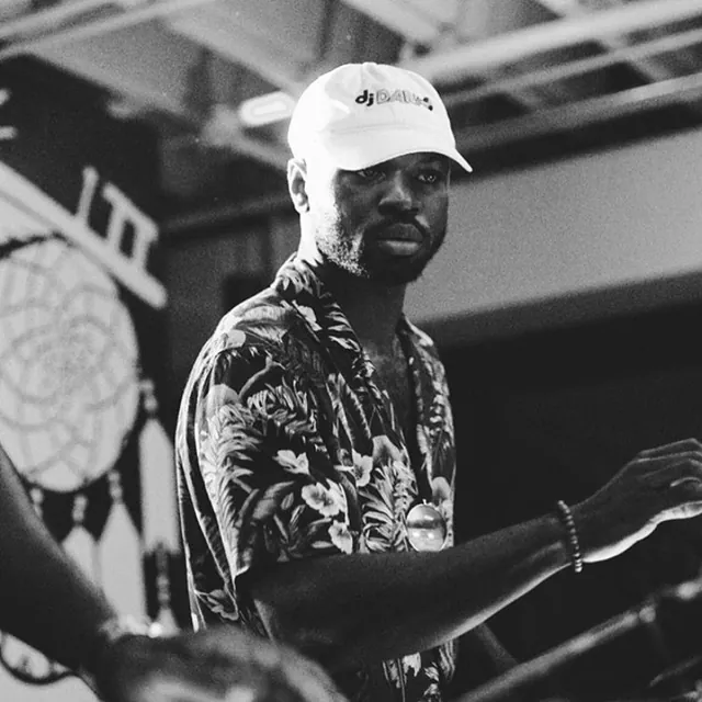 dj Darko working the decks, shot in black and white